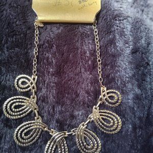 Monet, gold finish women's jewelry. (Pen writing on label Brand)